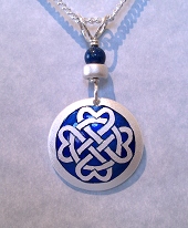 Celtic Heart Circle Pendant In Silver